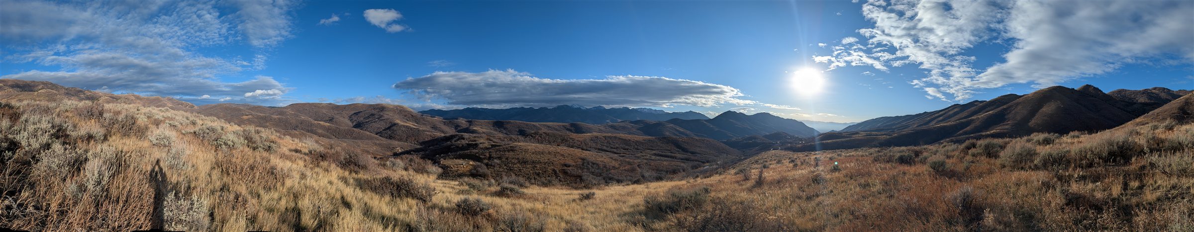 Bright panorama of a sunlit desert ridge in the Wasatch Back